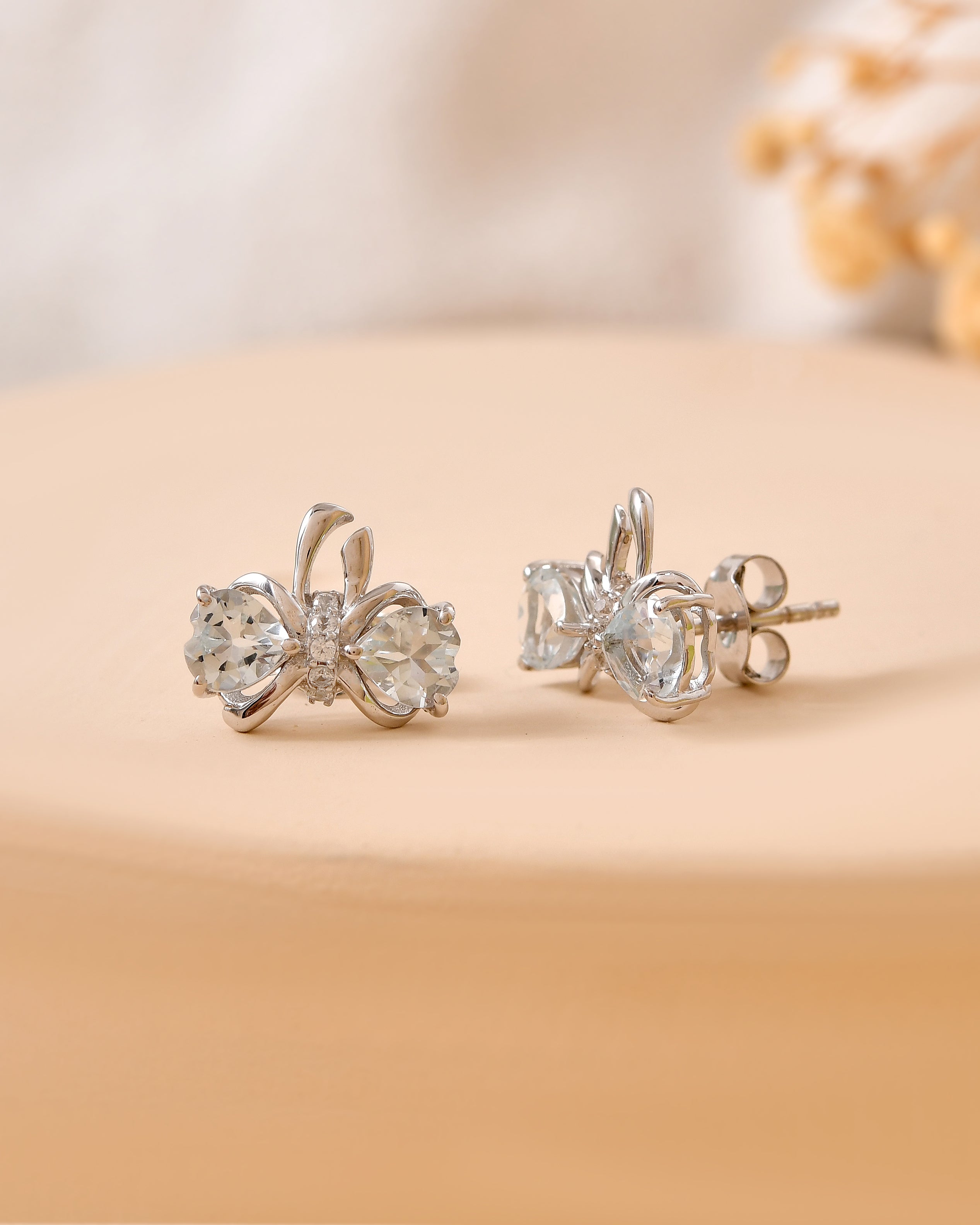 Aveline Sky Blue Topaz Bow Earrings